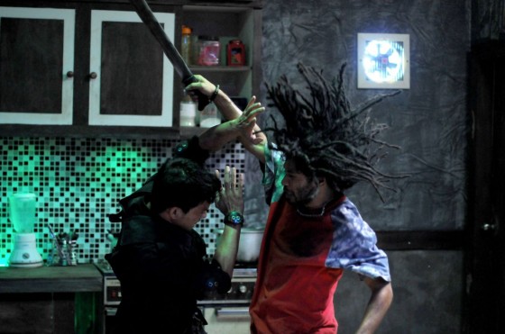 Iko Uwais, left, and Sofyan Alop in The Raid: Redemption